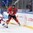 SOCHI, RUSSIA - APRIL 25: Canada's Dillon Heatherington #2 dumps the puck while being pressured by Czech Republic's Dominik Kubalik #25 during quarterfinal action 2013 IIHF Ice Hockey U18 World Championship. (Photo by Matthew Murnaghan/HHOF-IIHF Images)